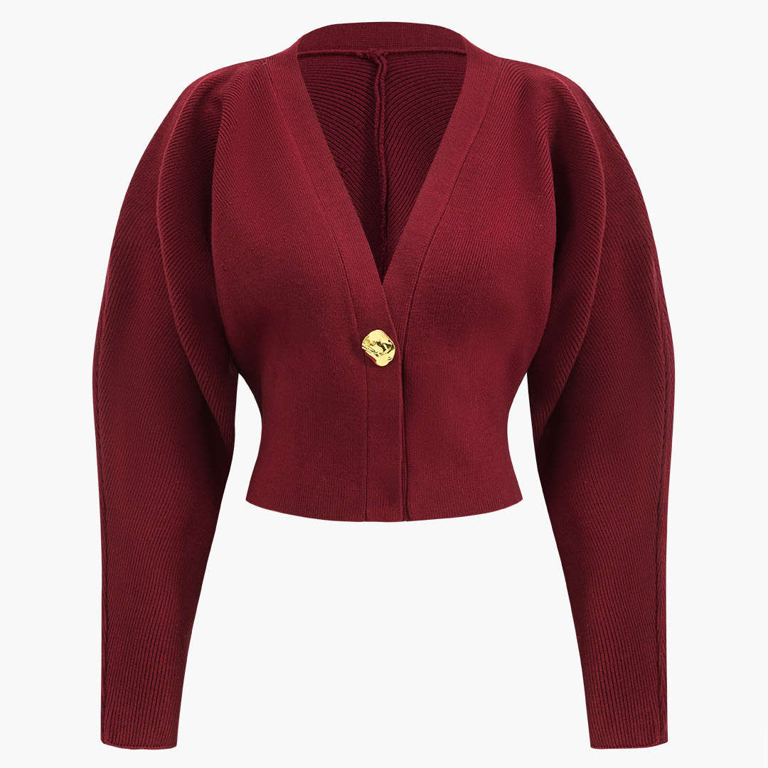 Elegancki sweter z serek dekoltem i ozdobnym guzikiem
