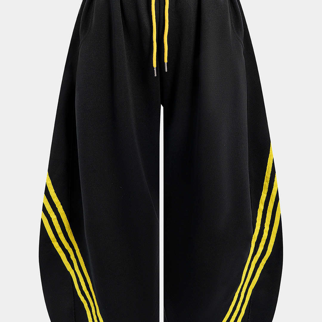 Spodnie plus size z kontrastowymi paskami