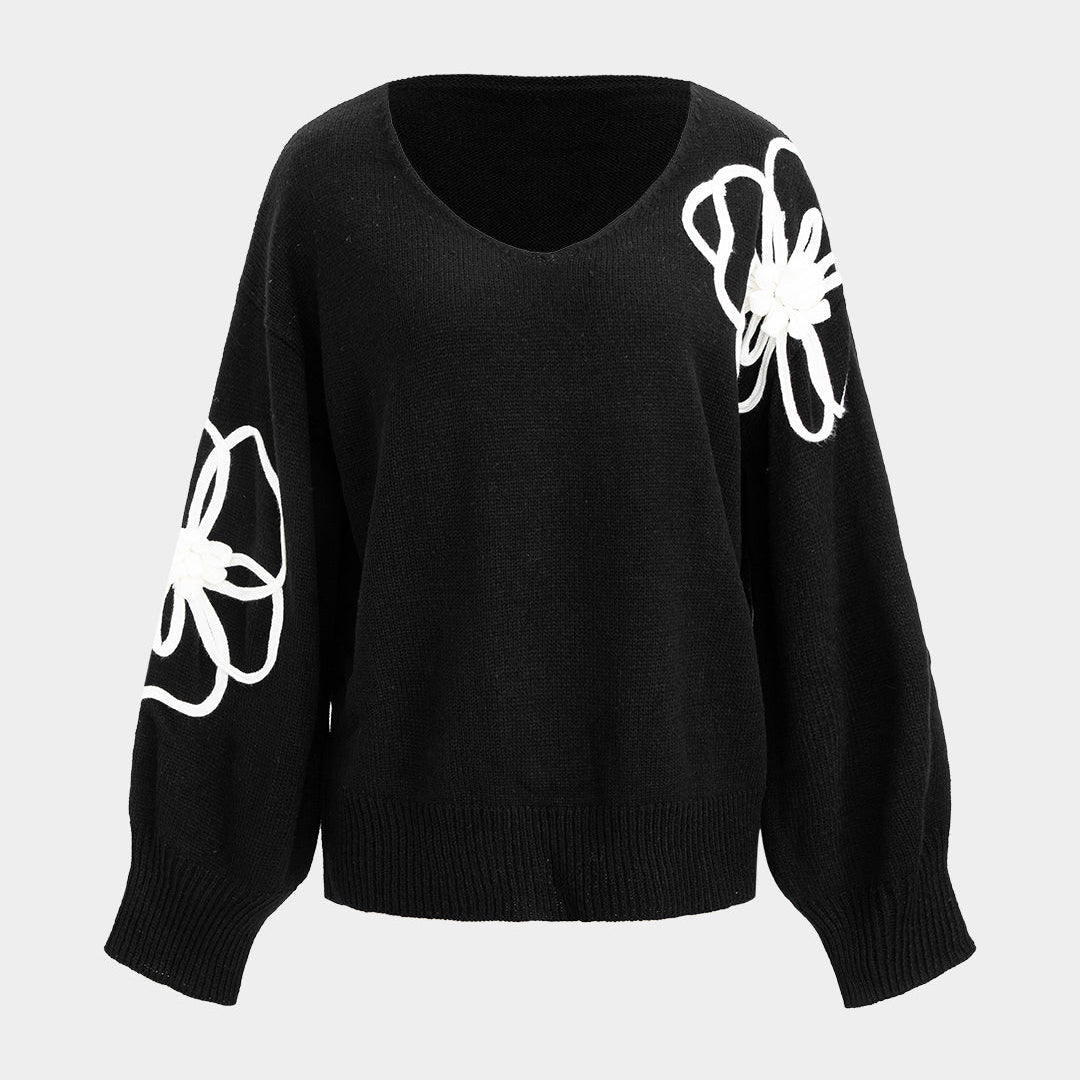 Dzianinowy sweter z kwiatowymi aplikacjami i dekoltem V