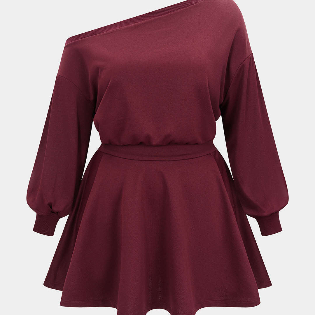 Asymetryczna mini sukienka z długimi rękawami plus size