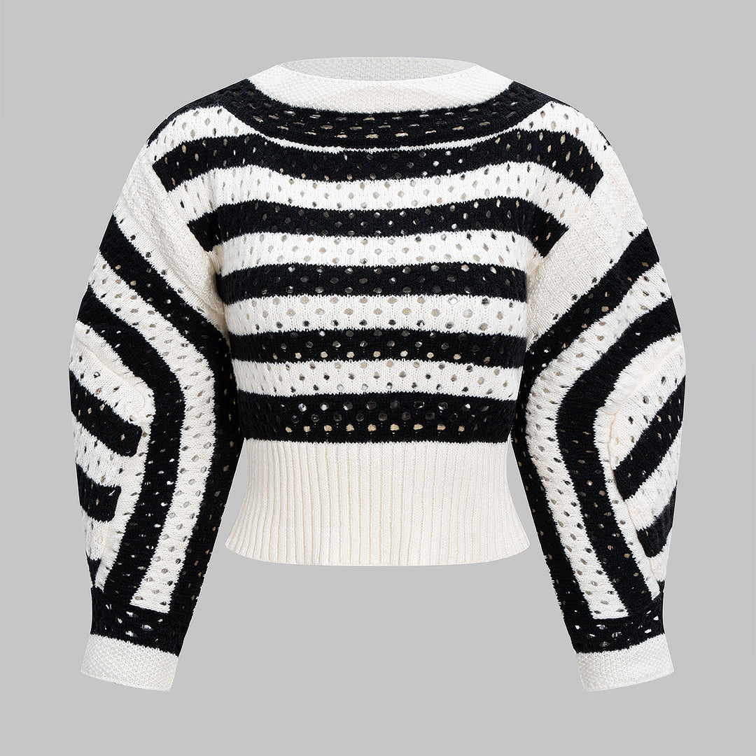 Sweter z dzianiny z wycięciami i długimi rękawami