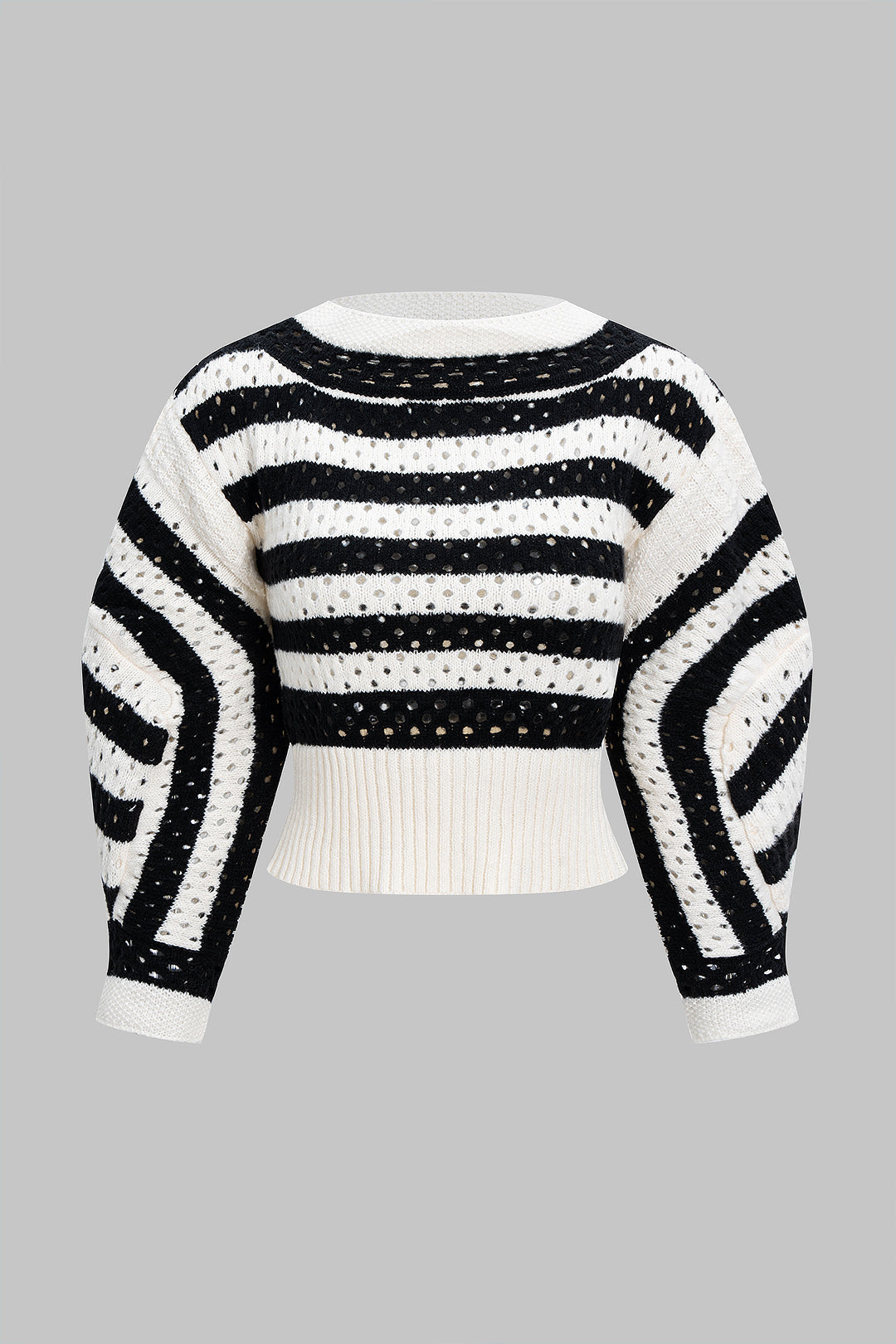 Sweter z dzianiny z wycięciami i długimi rękawami