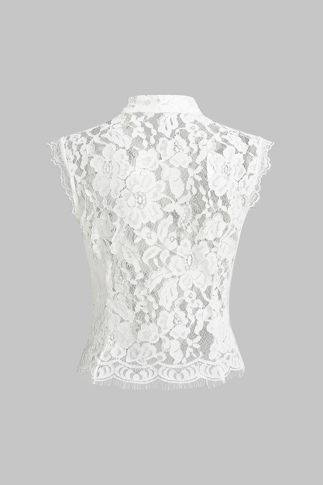 Elegancki top z koronką i ozdobnymi guzikami