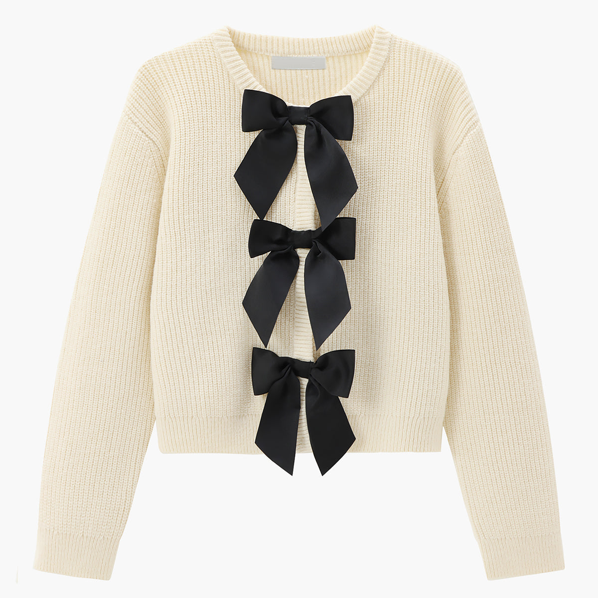 Elegancki sweter z kokardami na przodzie