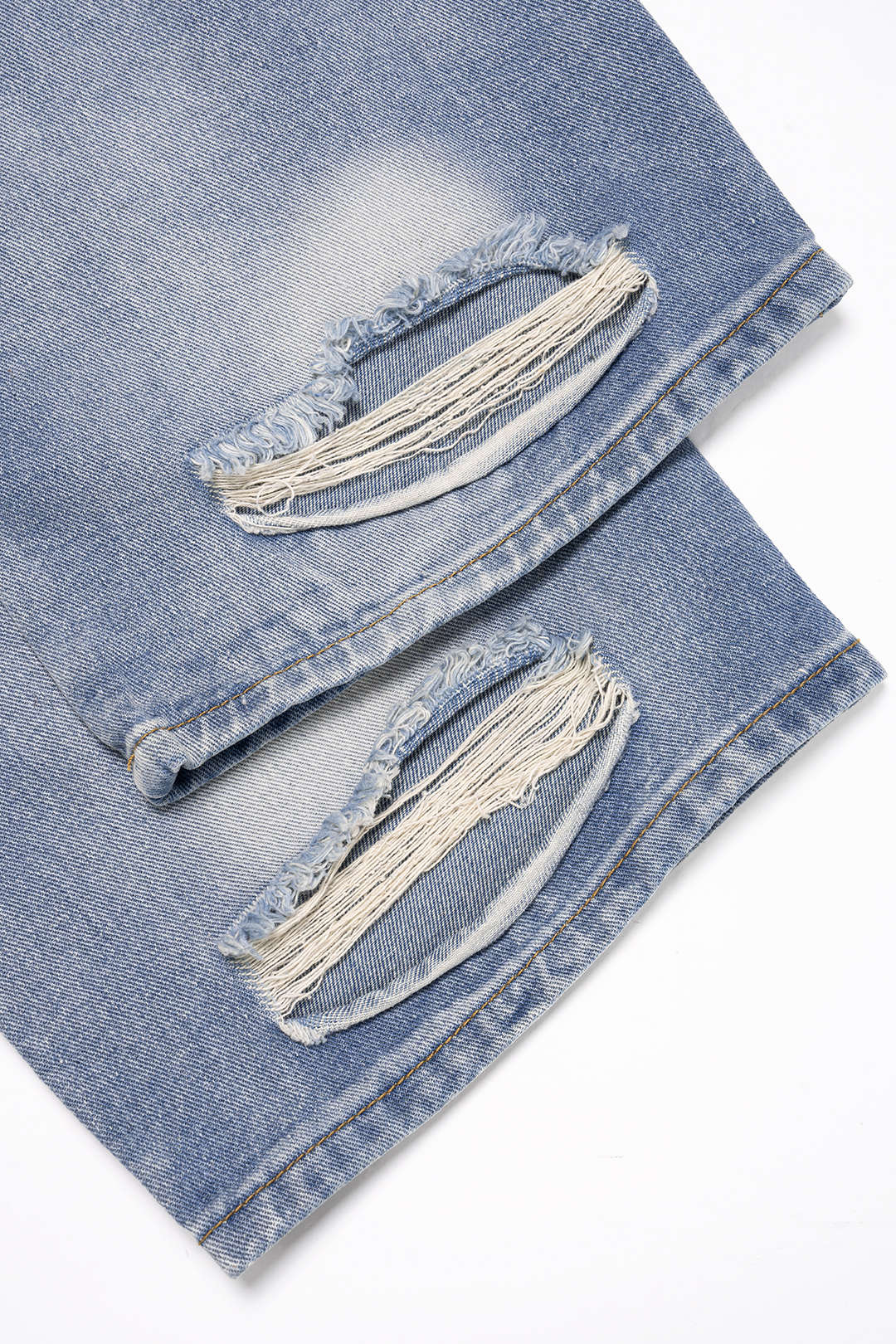 Proste jeansy z przetarciami z denimu