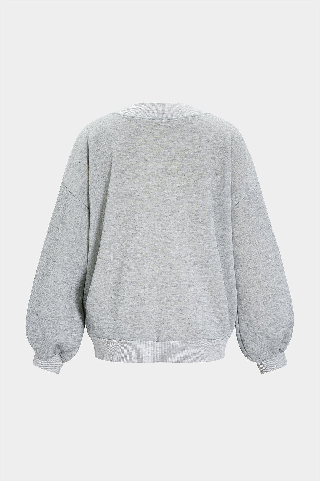 Oversize'owa bluza damska z dekoltem w serek