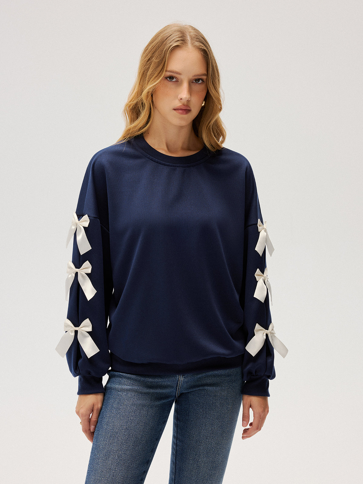 Bluza damska z kokardkami na rękawach