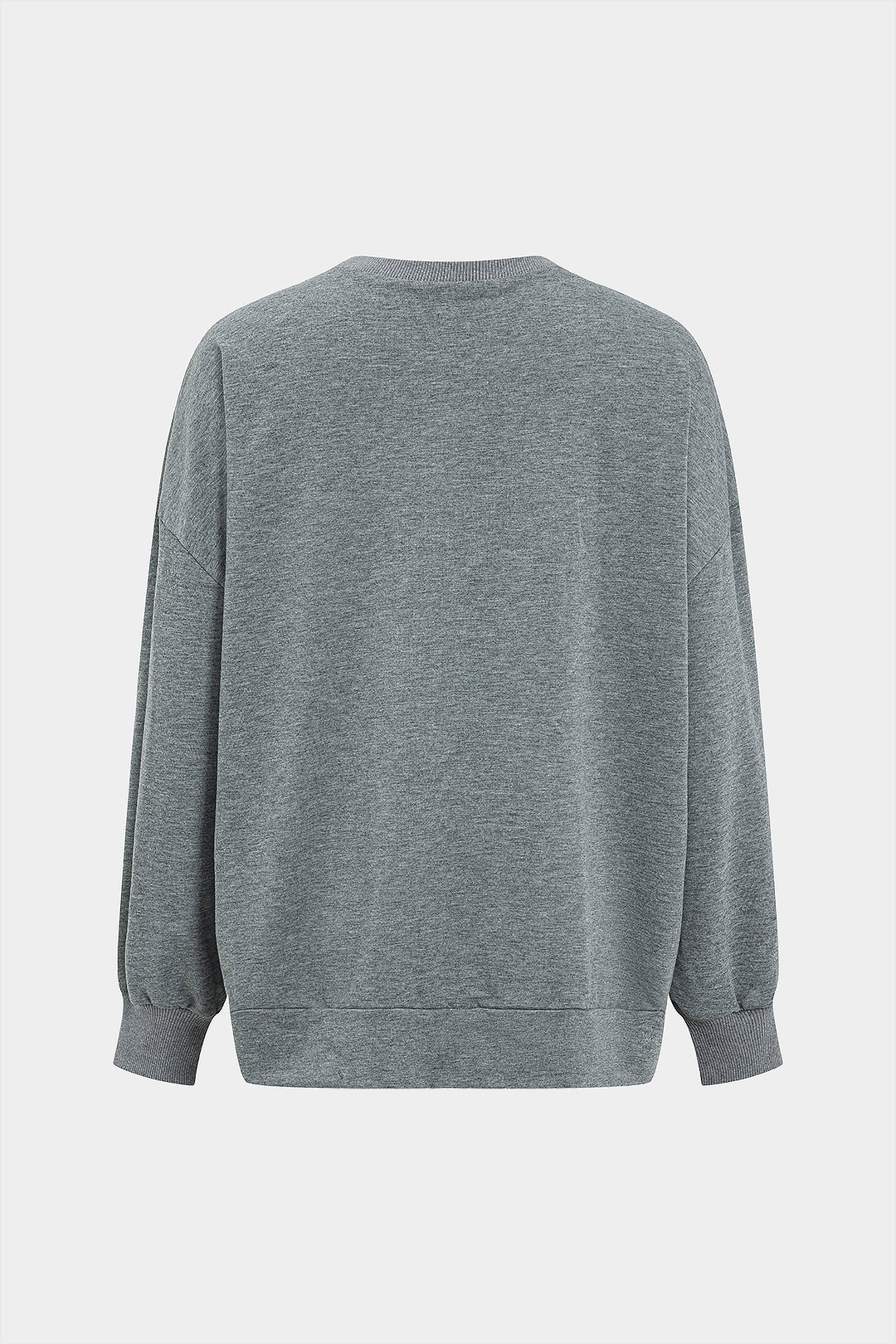 Bluza oversize z ozdobną kokardą na ramieniu