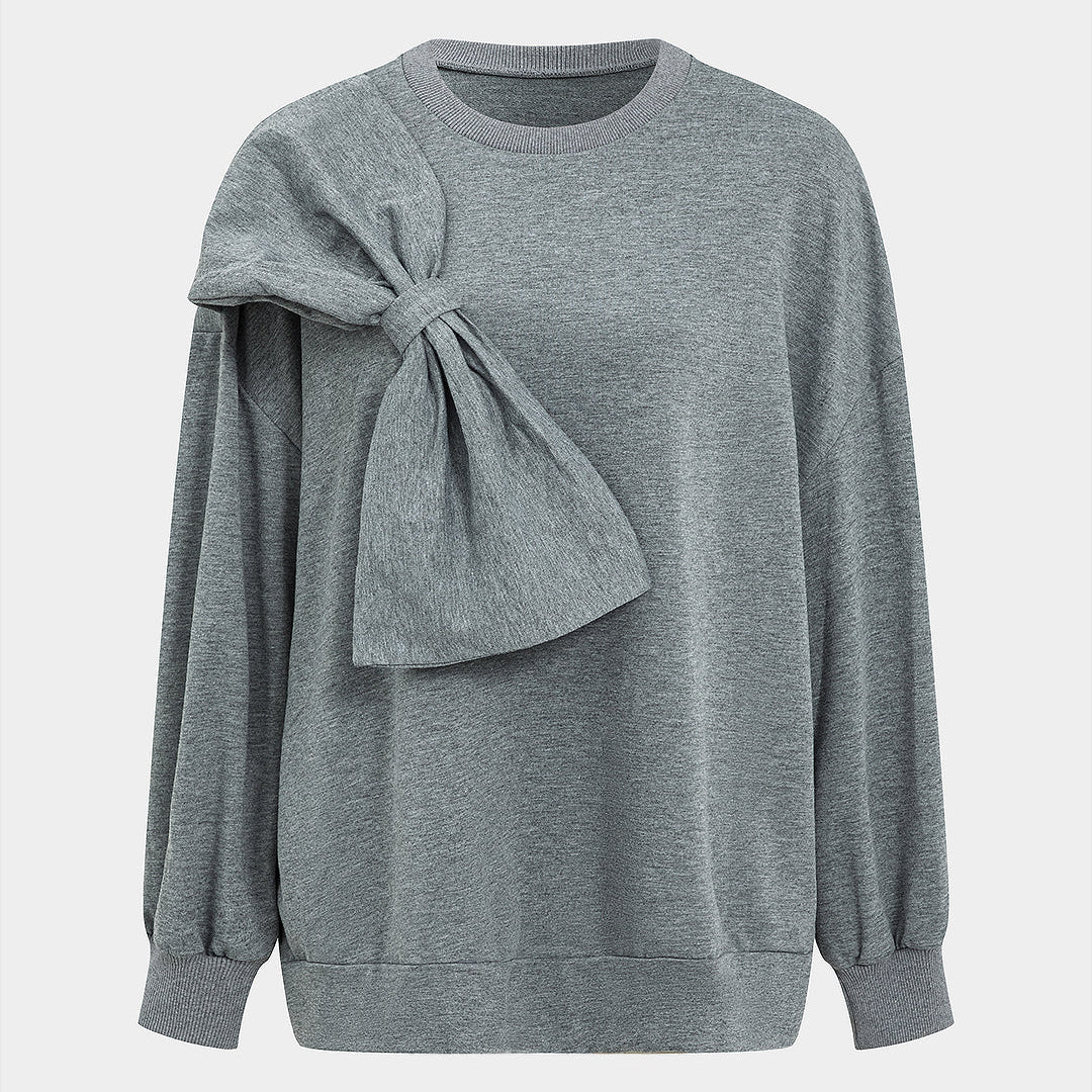Bluza z ozdobną kokardą na ramieniu