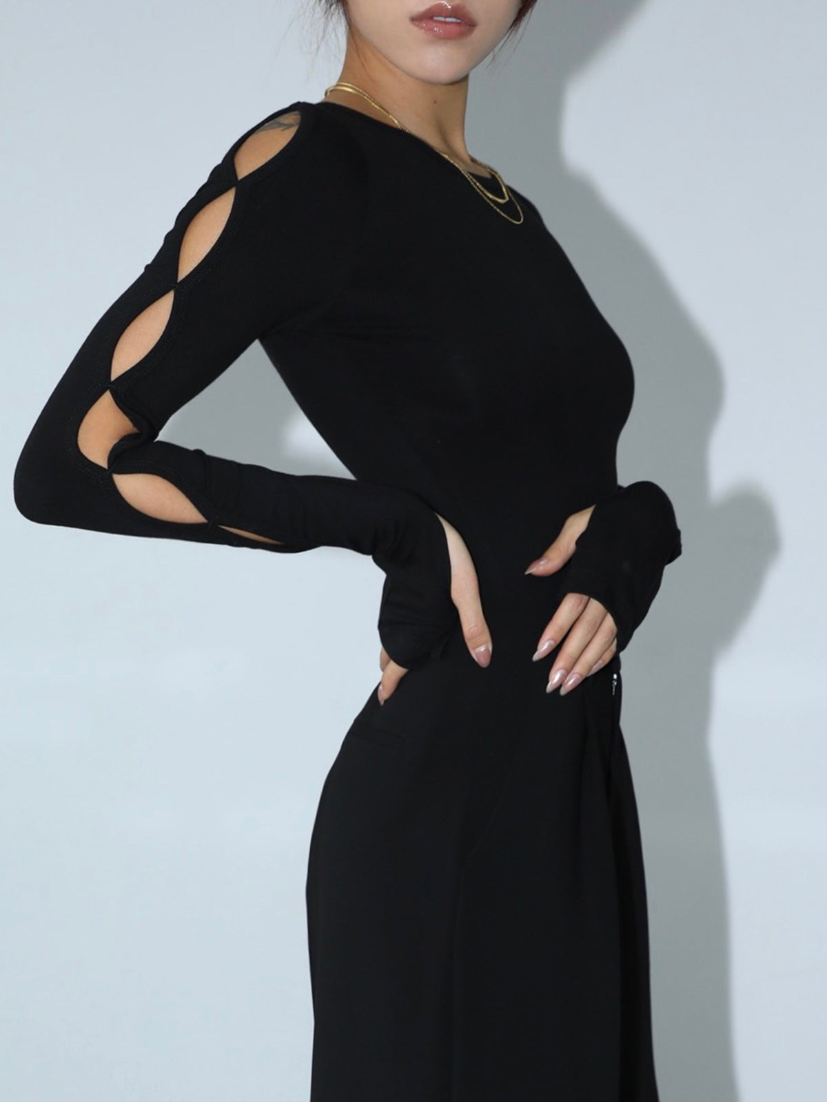 Bodysuit z wycięciami na rękawach