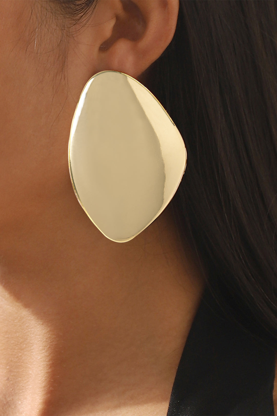 Kolczyki asymetryczne z dużą gładką powierzchnią