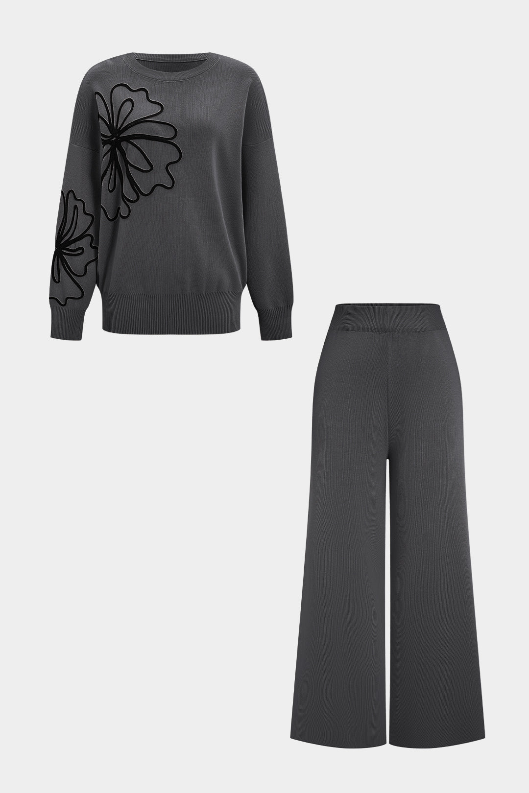 Komplet sweter i spodnie z kwiatową aplikacją