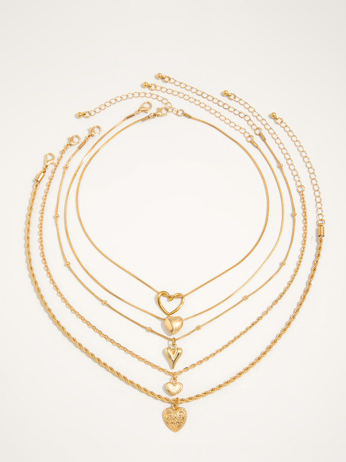 Naszyjnik z wieloma warstwami i sercami