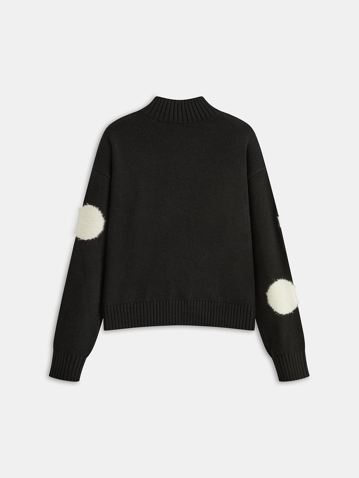 Sweter damski oversize z wyrazistymi wzorami