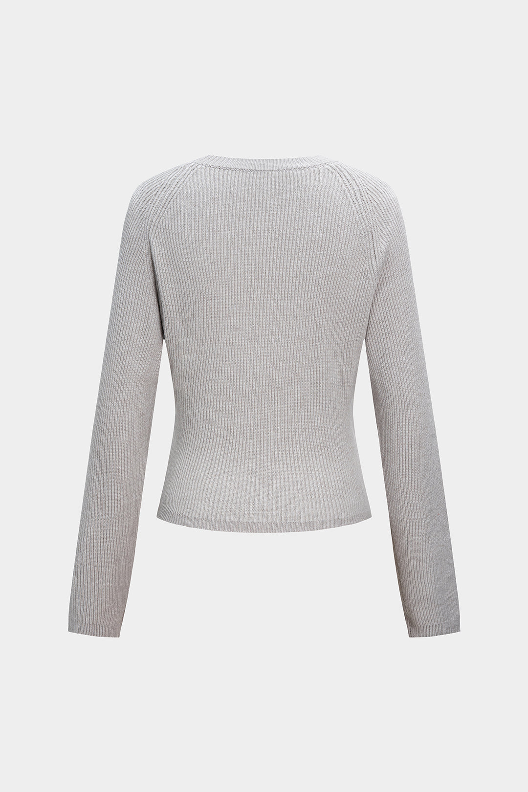 Sweter z kopertowym krojem i ozdobnymi guzikami